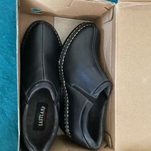Eastland women’s Black Slip-On shoes